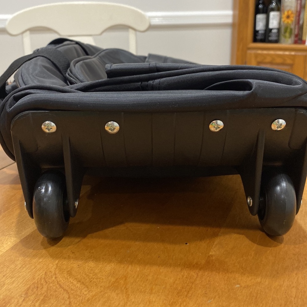 NWOT.  Nylon rolling carry-on bag. - Picture 13 of 13